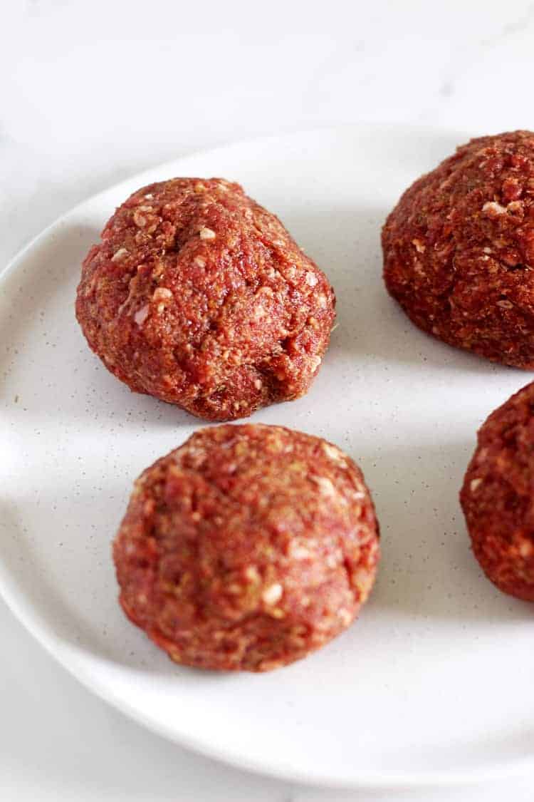 Rolled up beef burger patties